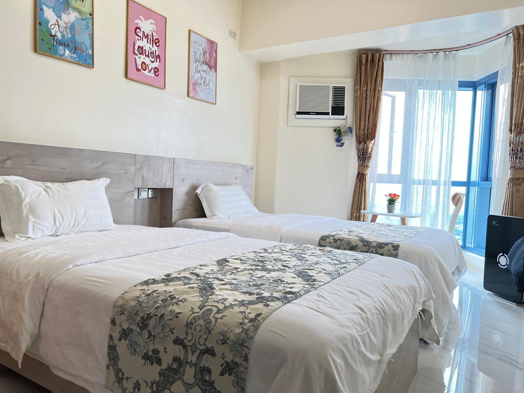 Aparthotel Dreamy Sunset Bay à Manille Extérieur photo
