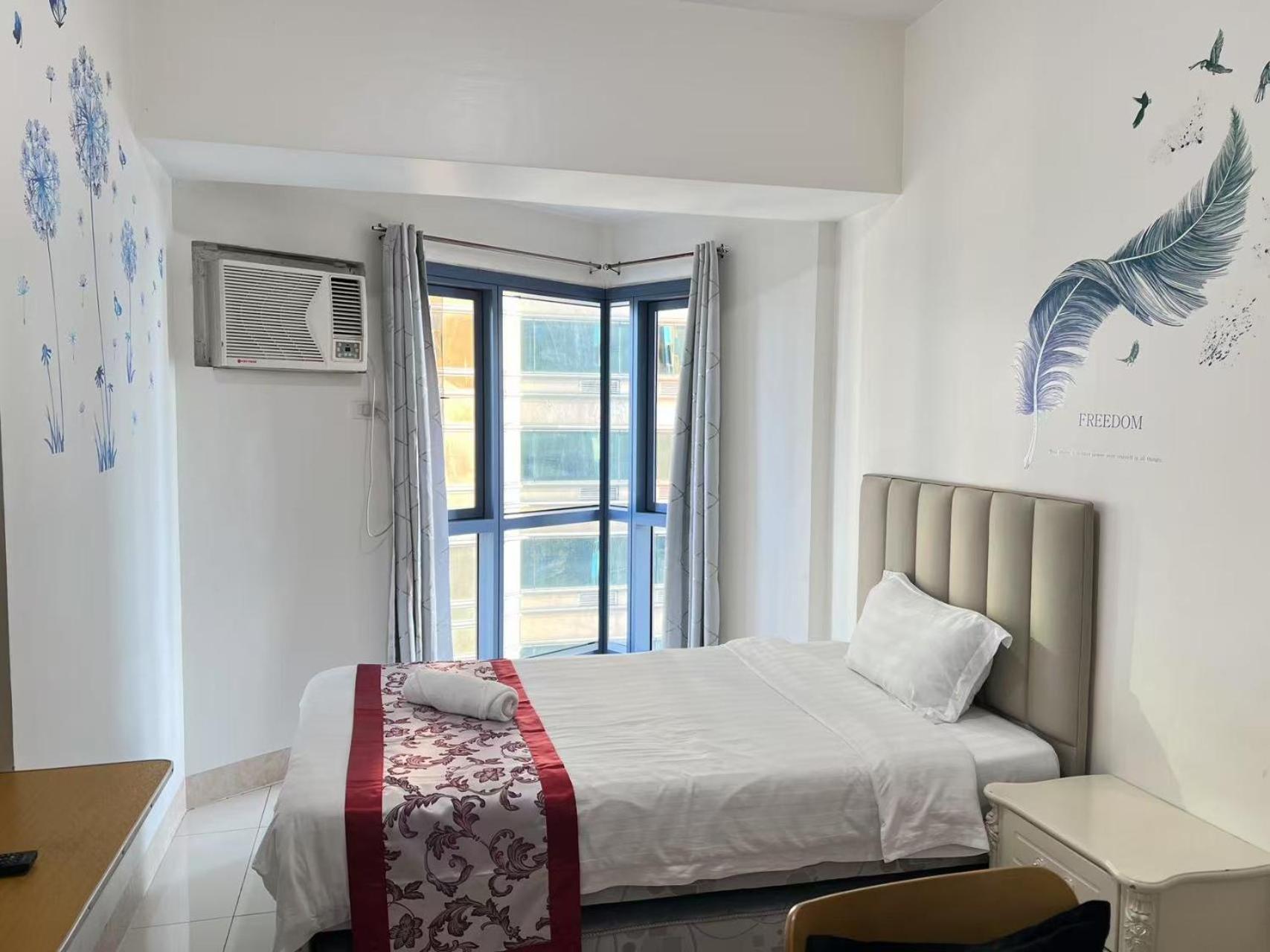 Aparthotel Dreamy Sunset Bay à Manille Extérieur photo
